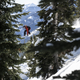 Elena Hight snowboarding in backcountry.